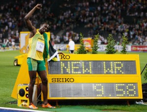 BERLIN - AUGUST 16: Usain Bolt of Jamaica celebrates winning the gold medal in the men's 100 Metres Final during day two of the 12th IAAF World Athletics Championships at the Olympic Stadium on August 16, 2009 in Berlin, Germany. Bolt set a new World Record of 9.58. (Photo by Andy Lyons/Getty Images)